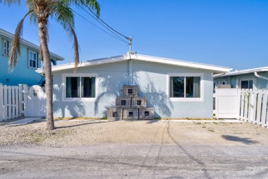 A sought-after opportunity to own a single-family home in Key on Key Colony Beach Golf Course in Florida - for sale on GolfHomes.com, golf home, golf lot