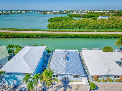 A sought-after opportunity to own a single-family home in Key on Key Colony Beach Golf Course in Florida - for sale on GolfHomes.com, golf home, golf lot