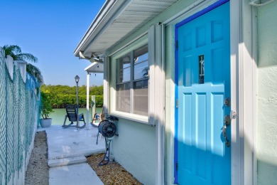 A sought-after opportunity to own a single-family home in Key on Key Colony Beach Golf Course in Florida - for sale on GolfHomes.com, golf home, golf lot