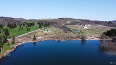 They say if your lucky enough to live on the lake than you're on Seven Oaks Golf Club in New York - for sale on GolfHomes.com, golf home, golf lot