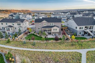 This exquisite residence offers a perfect blend of modern on Country Club at Castle Pines in Colorado - for sale on GolfHomes.com, golf home, golf lot