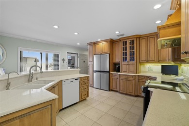 Discover one of the most desirable residences in Marina South on Burnt Store Golf Club in Florida - for sale on GolfHomes.com, golf home, golf lot