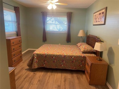 Under contract-accepting backup offers. Clean & Immaculate on Highland Lakes Executive Golf Course in Florida - for sale on GolfHomes.com, golf home, golf lot