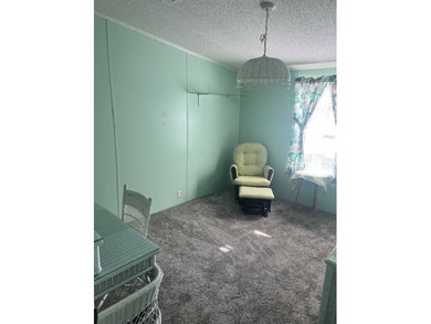 Well-priced, spacious home in a beautiful setting at The on Hamptons Golf Club in Florida - for sale on GolfHomes.com, golf home, golf lot