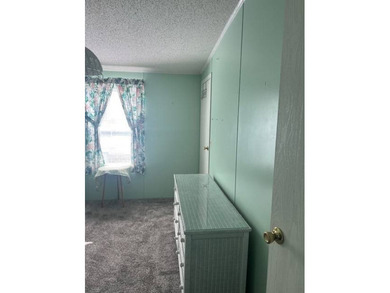 Well-priced, spacious home in a beautiful setting at The on Hamptons Golf Club in Florida - for sale on GolfHomes.com, golf home, golf lot