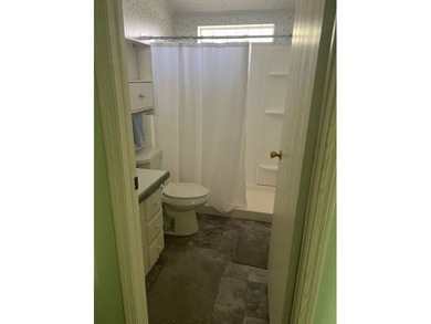 Well-priced, spacious home in a beautiful setting at The on Hamptons Golf Club in Florida - for sale on GolfHomes.com, golf home, golf lot