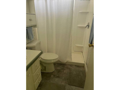 Well-priced, spacious home in a beautiful setting at The on Hamptons Golf Club in Florida - for sale on GolfHomes.com, golf home, golf lot