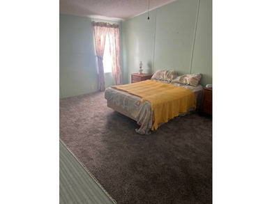 Well-priced, spacious home in a beautiful setting at The on Hamptons Golf Club in Florida - for sale on GolfHomes.com, golf home, golf lot