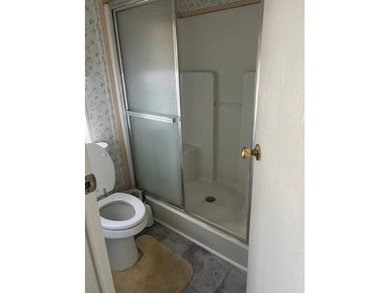 Well-priced, spacious home in a beautiful setting at The on Hamptons Golf Club in Florida - for sale on GolfHomes.com, golf home, golf lot