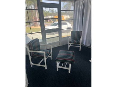 Well-priced, spacious home in a beautiful setting at The on Hamptons Golf Club in Florida - for sale on GolfHomes.com, golf home, golf lot