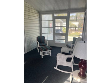 Well-priced, spacious home in a beautiful setting at The on Hamptons Golf Club in Florida - for sale on GolfHomes.com, golf home, golf lot