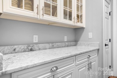 Step into this inviting home within Verdict Ridge Country Club on Verdict Ridge Golf and Country Club in North Carolina - for sale on GolfHomes.com, golf home, golf lot