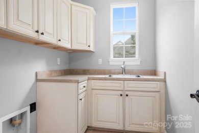 Step into this inviting home within Verdict Ridge Country Club on Verdict Ridge Golf and Country Club in North Carolina - for sale on GolfHomes.com, golf home, golf lot