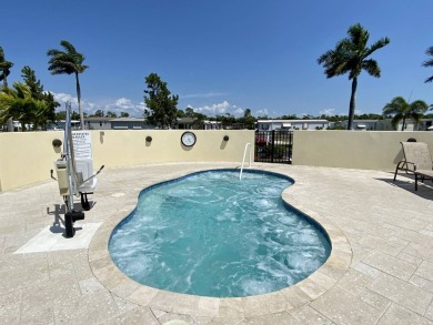 TOTALLY MODERN & OPEN DESIGN WITH HIGH CEILINGS AND PERFECT on Royal Wood Golf and Country Club in Florida - for sale on GolfHomes.com, golf home, golf lot