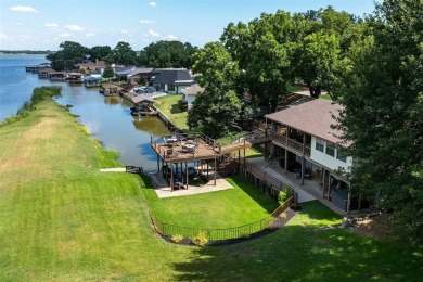 This lovely lake house in the Cedar Creek Country Club golf on Cedar Creek Country Club in Texas - for sale on GolfHomes.com, golf home, golf lot