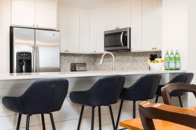 Indulge in luxury with this turnkey penthouse oceanfront condo on Wild Dunes Harbor Golf Resort in South Carolina - for sale on GolfHomes.com, golf home, golf lot
