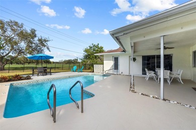 PRICE DROP ALERT!
Stunning Golf Course Pool Home with Sunset on Sara Bay Country Club in Florida - for sale on GolfHomes.com, golf home, golf lot