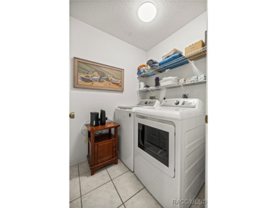 Jump in your golf cart and take a trip down Country Club to 645 on Plantation Inn and Golf Resort  in Florida - for sale on GolfHomes.com, golf home, golf lot