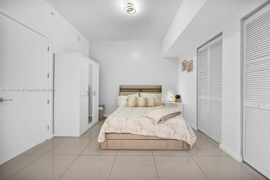 Unit 1908 at 5252 Paseo in Downtown Doral is a 1-bedroom on Doral Golf Resort in Florida - for sale on GolfHomes.com, golf home, golf lot