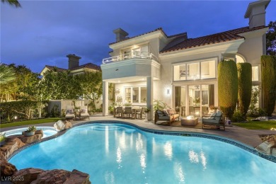 Floor-to-ceiling windows frame the lush greens of the 7th hole on Canyon Gate Country Club in Nevada - for sale on GolfHomes.com, golf home, golf lot