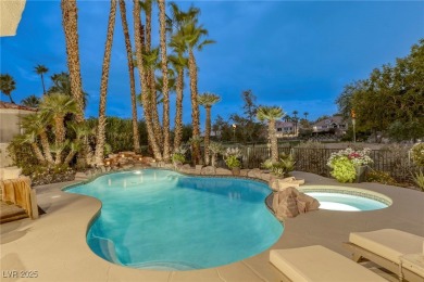 Floor-to-ceiling windows frame the lush greens of the 7th hole on Canyon Gate Country Club in Nevada - for sale on GolfHomes.com, golf home, golf lot