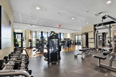 Unit 1908 at 5252 Paseo in Downtown Doral is a 1-bedroom on Doral Golf Resort in Florida - for sale on GolfHomes.com, golf home, golf lot