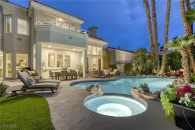 Floor-to-ceiling windows frame the lush greens of the 7th hole on Canyon Gate Country Club in Nevada - for sale on GolfHomes.com, golf home, golf lot