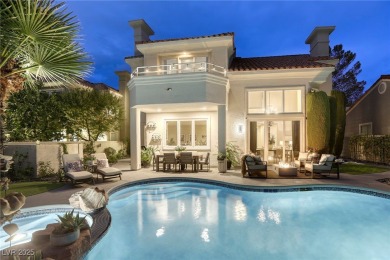Floor-to-ceiling windows frame the lush greens of the 7th hole on Canyon Gate Country Club in Nevada - for sale on GolfHomes.com, golf home, golf lot