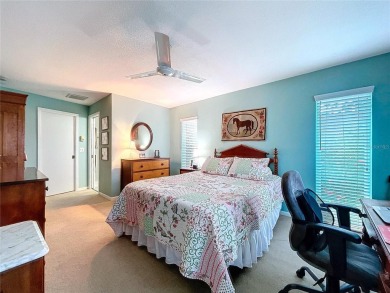 Charming 3-Bedroom Solar Heated Pool Home with Golf Course Views on Seminole Lake Country Club in Florida - for sale on GolfHomes.com, golf home, golf lot