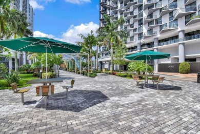 Unit 1908 at 5252 Paseo in Downtown Doral is a 1-bedroom on Doral Golf Resort in Florida - for sale on GolfHomes.com, golf home, golf lot