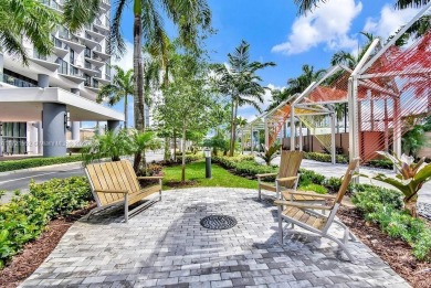 Unit 1908 at 5252 Paseo in Downtown Doral is a 1-bedroom on Doral Golf Resort in Florida - for sale on GolfHomes.com, golf home, golf lot