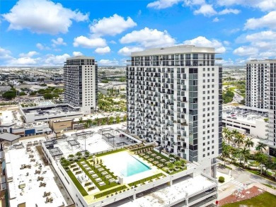 Unit 1908 at 5252 Paseo in Downtown Doral is a 1-bedroom on Doral Golf Resort in Florida - for sale on GolfHomes.com, golf home, golf lot