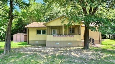 Experience relaxed lake living in this inviting 2-bedroom on Links At Lands End in Texas - for sale on GolfHomes.com, golf home, golf lot