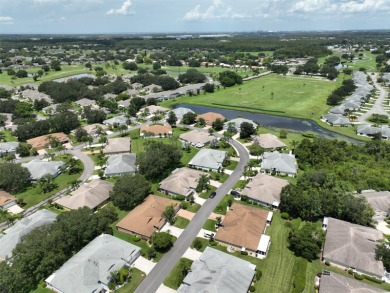 Ready to retire and enjoy a fun maintenance free lifestyle? on Falcon Watch Golf Club in Florida - for sale on GolfHomes.com, golf home, golf lot