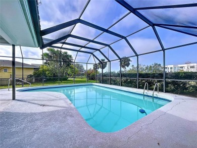 Charming 3-Bedroom Solar Heated Pool Home with Golf Course Views on Seminole Lake Country Club in Florida - for sale on GolfHomes.com, golf home, golf lot