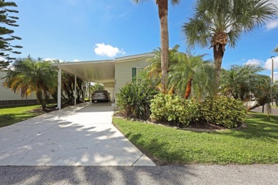 Fully furnished and spacious 27'x58' manufactured home. Built in on Maple Leaf Golf and Country Club in Florida - for sale on GolfHomes.com, golf home, golf lot