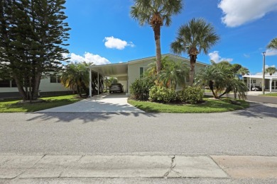 Fully furnished and spacious 27'x58' manufactured home. Built in on Maple Leaf Golf and Country Club in Florida - for sale on GolfHomes.com, golf home, golf lot