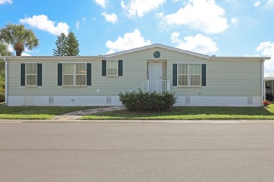 Fully furnished and spacious 27'x58' manufactured home. Built in on Maple Leaf Golf and Country Club in Florida - for sale on GolfHomes.com, golf home, golf lot