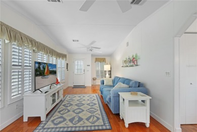 Fully furnished and spacious 27'x58' manufactured home. Built in on Maple Leaf Golf and Country Club in Florida - for sale on GolfHomes.com, golf home, golf lot