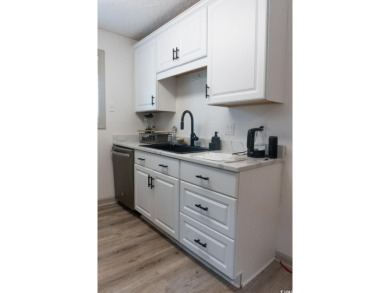 Welcome to SHOREWOOD! This beautifully updated condo, nestled on on Myrtlewood Golf Course and Club  in South Carolina - for sale on GolfHomes.com, golf home, golf lot