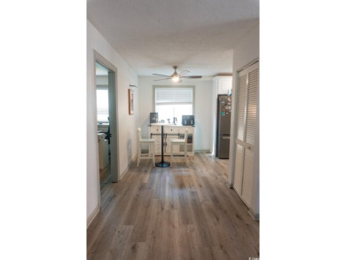 Welcome to SHOREWOOD! This beautifully updated condo, nestled on on Myrtlewood Golf Course and Club  in South Carolina - for sale on GolfHomes.com, golf home, golf lot