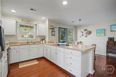 This precious patio home offers stunning views of the lagoon and on  in Georgia - for sale on GolfHomes.com, golf home, golf lot