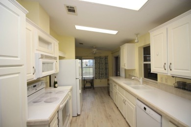 Charming 2-Bedroom, 2-Bath Home with Den on Golf Course in Blue on Blue Heron Pines Golf Course in Florida - for sale on GolfHomes.com, golf home, golf lot
