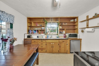 A quaint southwestern house set in a peaceful, quiet on Mick Riley Golf Course in Utah - for sale on GolfHomes.com, golf home, golf lot