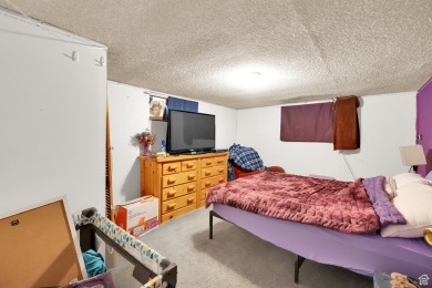 A quaint southwestern house set in a peaceful, quiet on Mick Riley Golf Course in Utah - for sale on GolfHomes.com, golf home, golf lot