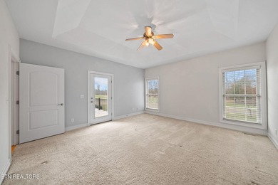 Discover comfort, style, and scenic golf-front living in this on Deer Creek Golf Club in Tennessee - for sale on GolfHomes.com, golf home, golf lot