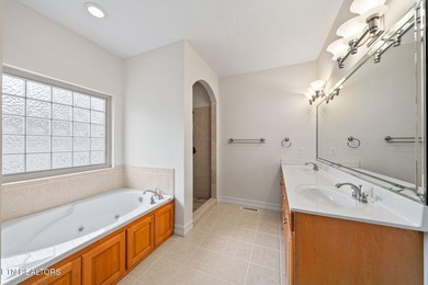 Discover comfort, style, and scenic golf-front living in this on Deer Creek Golf Club in Tennessee - for sale on GolfHomes.com, golf home, golf lot