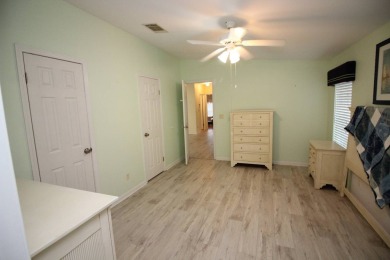 Charming 2-Bedroom, 2-Bath Home with Den on Golf Course in Blue on Blue Heron Pines Golf Course in Florida - for sale on GolfHomes.com, golf home, golf lot