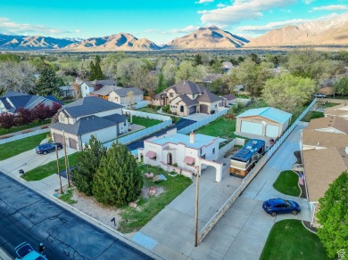 A quaint southwestern house set in a peaceful, quiet on Mick Riley Golf Course in Utah - for sale on GolfHomes.com, golf home, golf lot