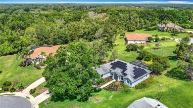 One or more photo(s) has been virtually staged. Nestled at the on Harbor Hills Country Club in Florida - for sale on GolfHomes.com, golf home, golf lot
